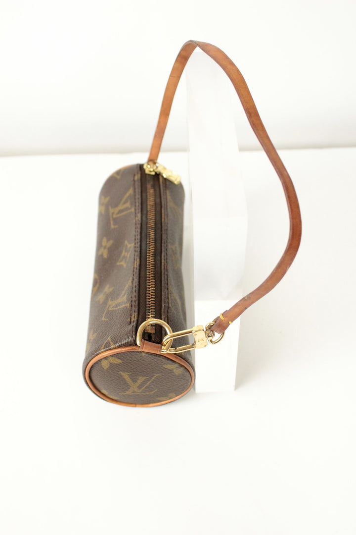 Louis Vuitton brown micro mini pouch bag with monogram pattern and vachetta leather trim.