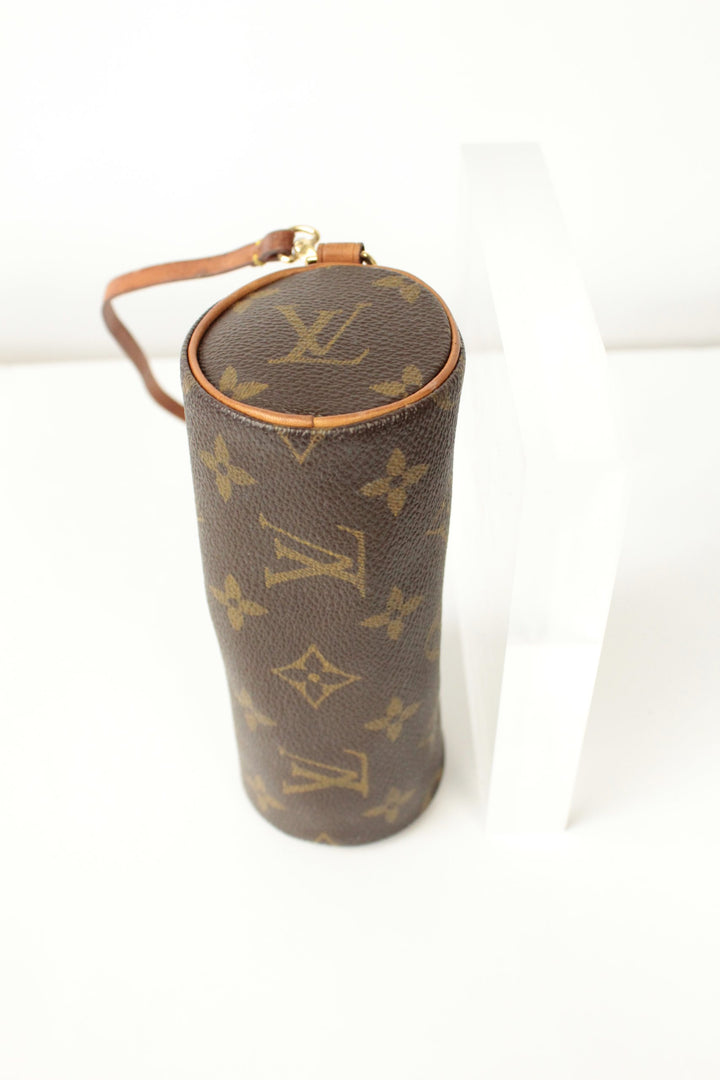 Louis Vuitton brown micro mini pouch bag with monogram pattern and vachetta leather trim.
