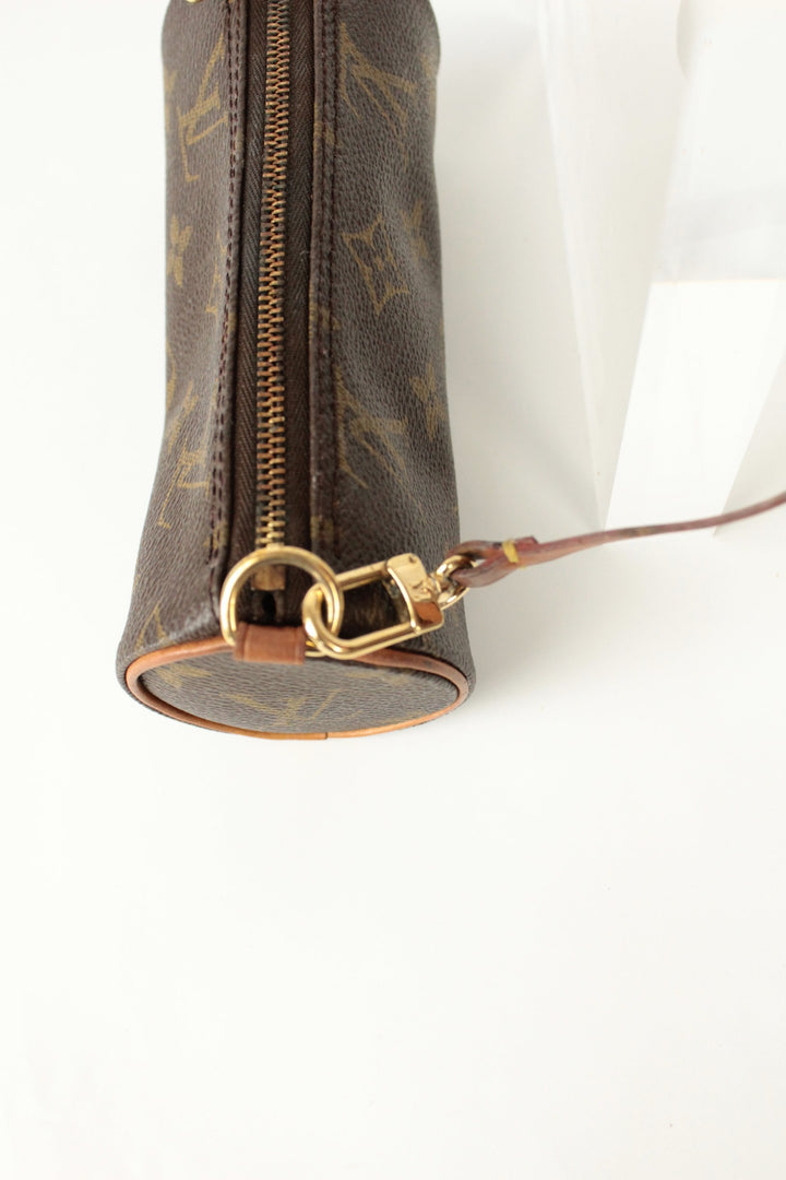 Louis Vuitton brown micro mini pouch bag with monogram pattern and vachetta leather trim.