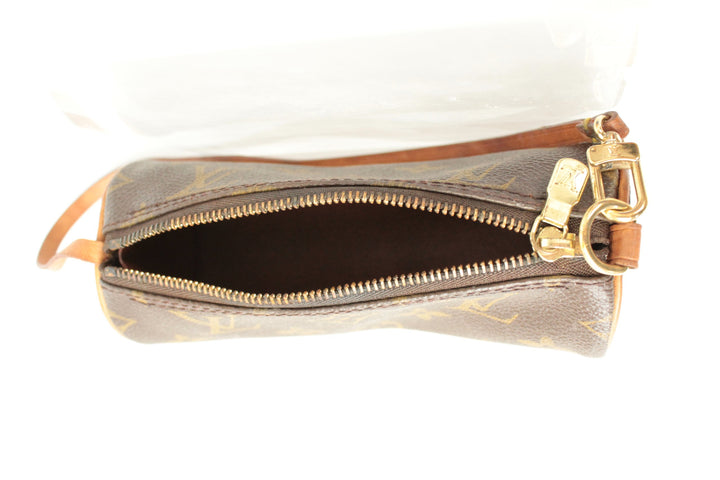 Louis Vuitton brown micro mini pouch bag with monogram pattern and vachetta leather trim.