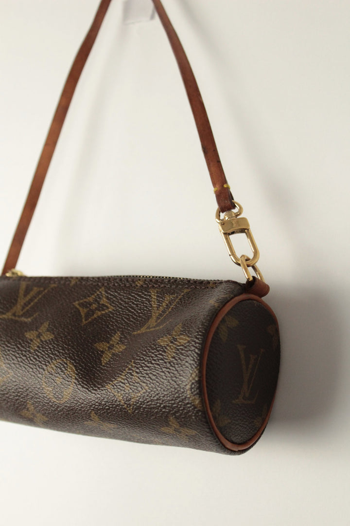 Louis Vuitton brown micro mini pouch bag with monogram pattern and vachetta leather trim.