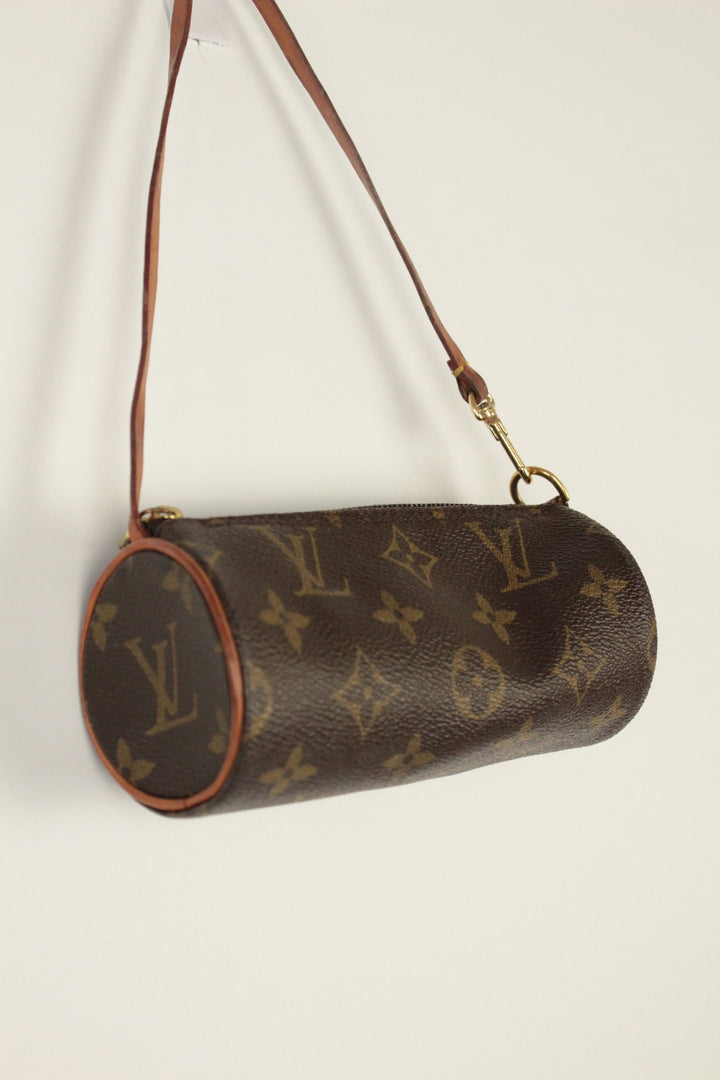 Louis Vuitton brown micro mini pouch bag with monogram pattern and vachetta leather trim.